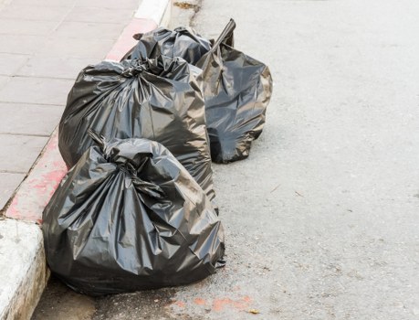 Professional rubbish removal team in Plaistow at work