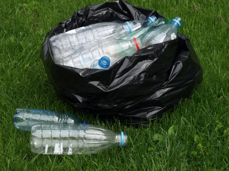 Muck away trucks collecting household waste in Plaistow
